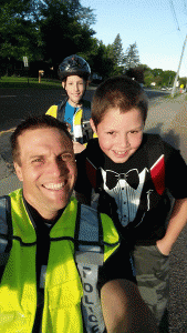 Officer Keffer with children on the first day of school.